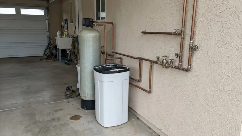 Water softener and brine tank in a garage
